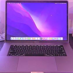 2016 Apple MacBook Pro 15" i7 Intel Core W/ Touch Bar (Grey)
