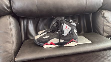 Black and gray Jordan shoes