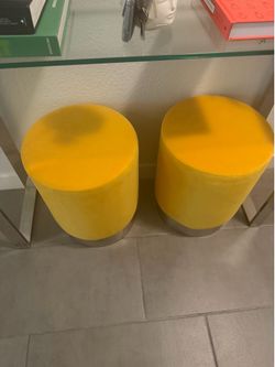 Yellow ottomans set of 2