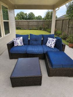 Premium Outdoor Wicker Sectional Patio Set – Deep Blue Cushions, Ottoman & Glass-Top Coffee Table