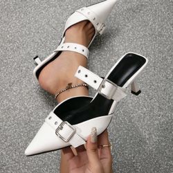 Pointed white heels
