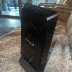 NetGear Nighthawk CM1200 W/NetGear GS605 