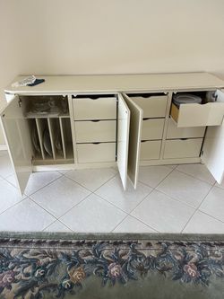 Dining room buffet cabinet with drawers.