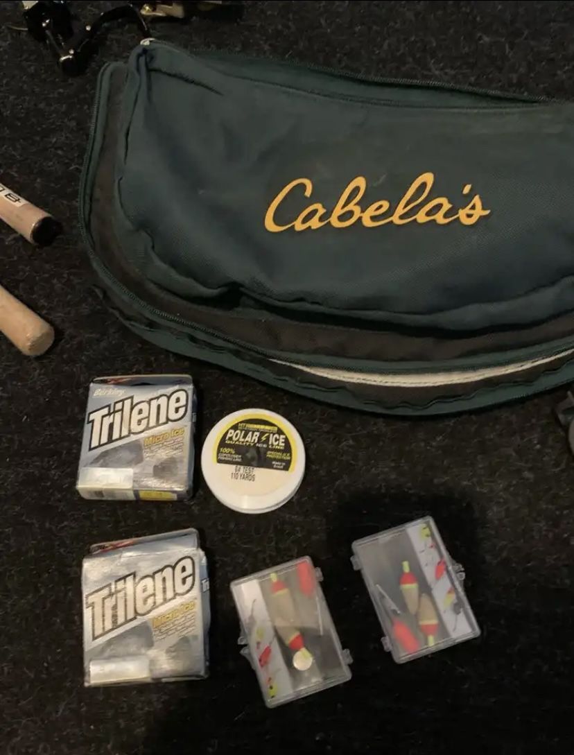 Cabela’s Ice Fishing Rods and Reels in their own case. 