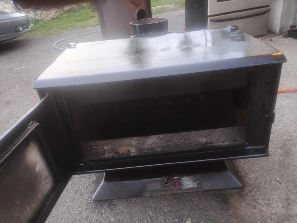 Wood Stove Cleaned Up And Freshly Painted