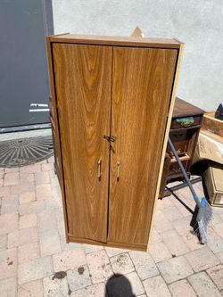 Free cupboard, 10.5 inches wide 12 inches deep 52 inches tall