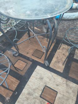 Wrought iron chairs set of four