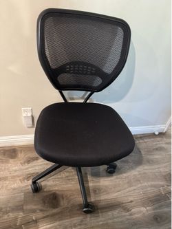 Black adjustable in height desk chair