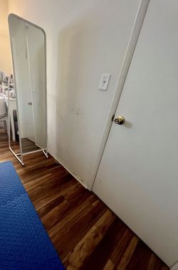 Floor Mirror with hanging coat/clothes on the back