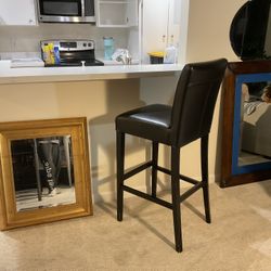 black leather barstool with real wood legs