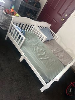 2 toddler beds with mattress