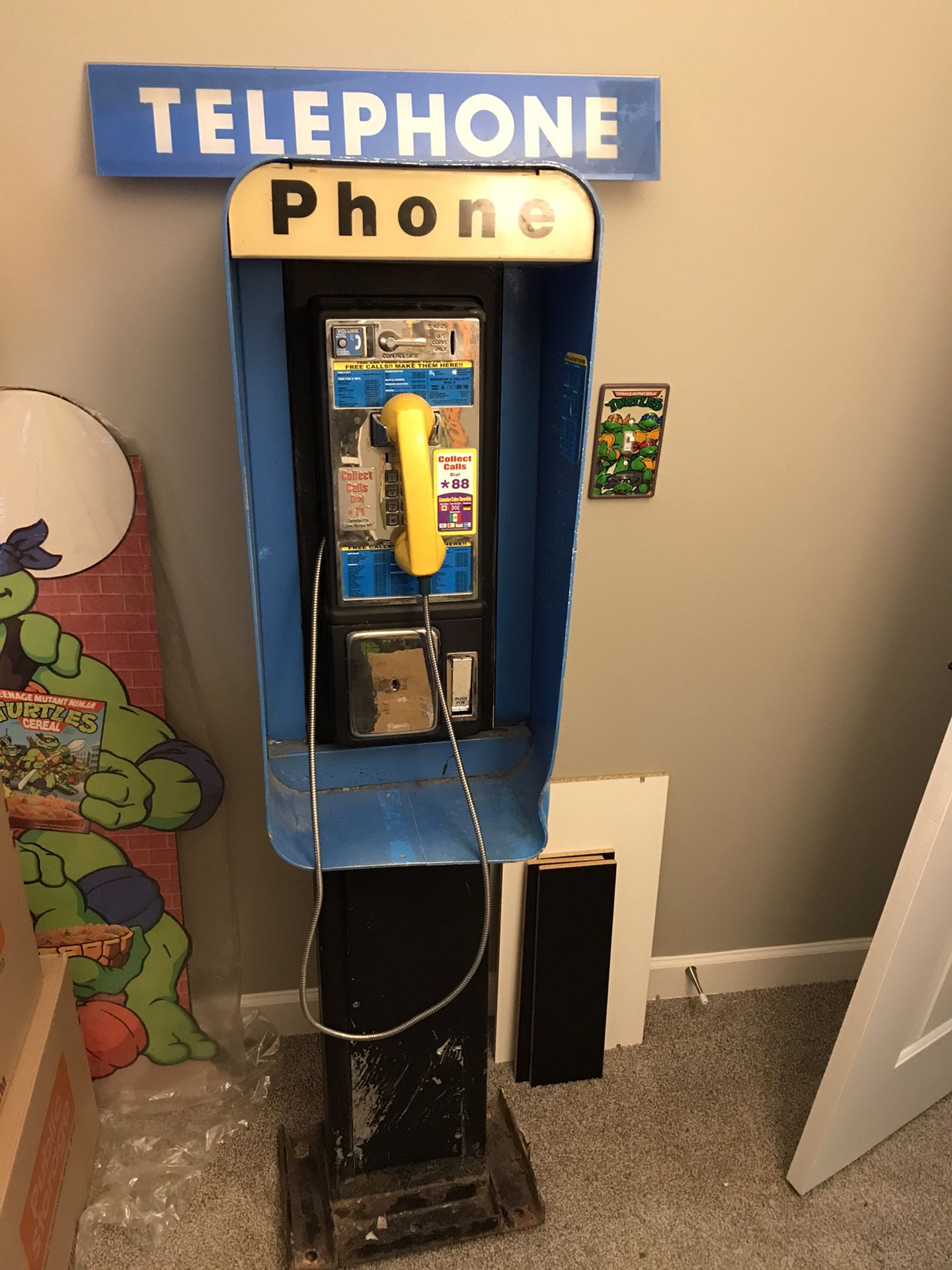 Payphone With Sign