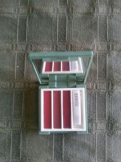 Clinique lipstick case with brush