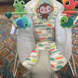Baby bouncer with vibration