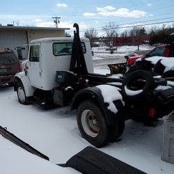 Older Roll Off Truck