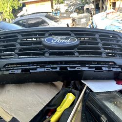 Grill And Bumper With Headlights