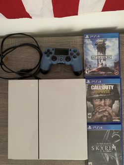 PS4 With Controller And Games