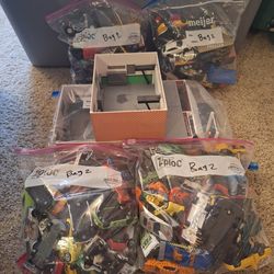 4 Bags Of Assorted Cars with 3 Diorama Sets