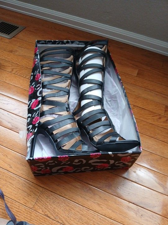 Black knee length high heels