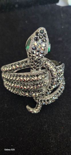 Coiled snake hinge statement bracelet