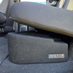 Kicker subwoofer enclosure with two 12" speakers And 1200 Watt Kicker Amp. 