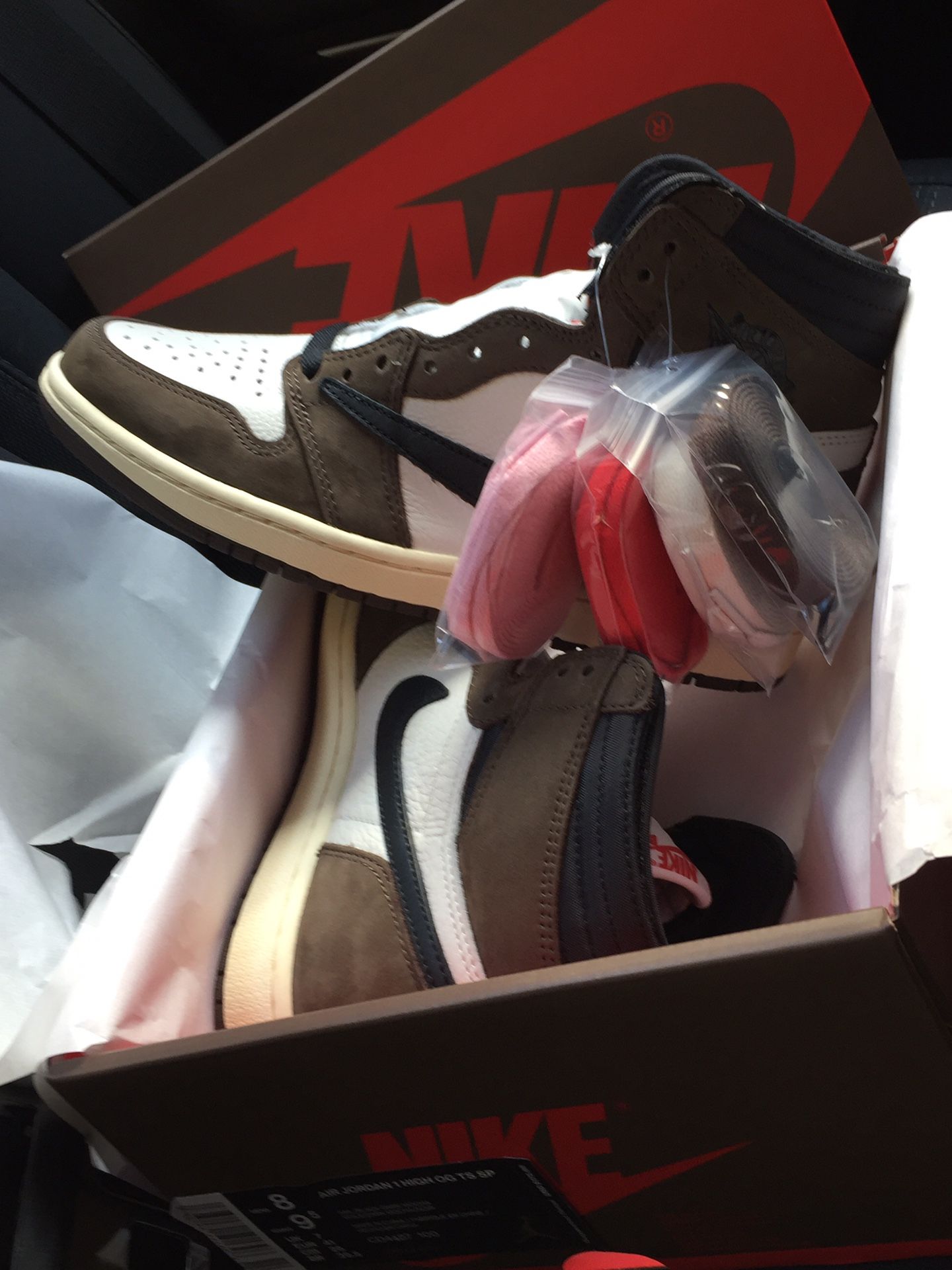 Jordan 1 Travis Scott with merch