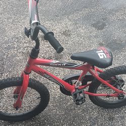 Huffy Boys  Red Bike With Training Wheels 