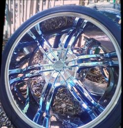 26 in rims and tires wiith center caps