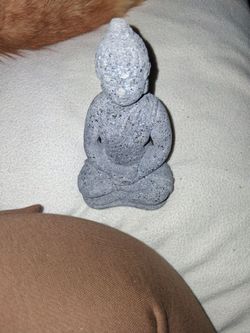 Lava stone buddha