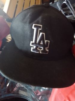 LA Dodger Hat & Red Sox / White Sox Hat ( Idk what one it is lol )