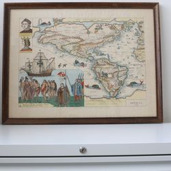 Framed vintage “America 1562” illustrated map