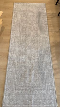 2 1/2’ by 7’ Area Rug