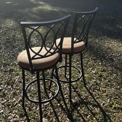 Pair Of Black Metal Swivel Barstools 