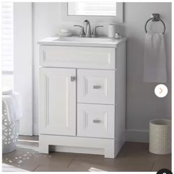 Sedgewood 24.5 in. W x 18.75 in. D x 34.375 in. H Single Sink Bath Vanity in White with Arctic Solid Surface Top