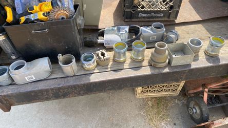 Conduit Hubs / Fittings: Threaded metal compression/ground hubs (some with yellow O-ring seals) designed for secure, watertight or grounded connection
