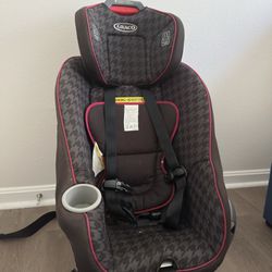 Graco Toddler/ Small child front or rear facing car seat 