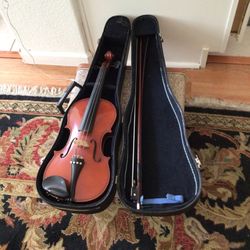    Old Violin But looks brand new Works Very good Nice Case Too