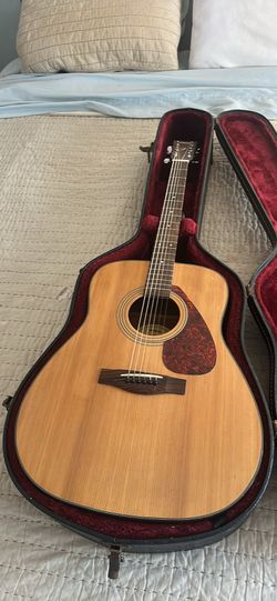 Yamaha guitar and Martin & Co case
