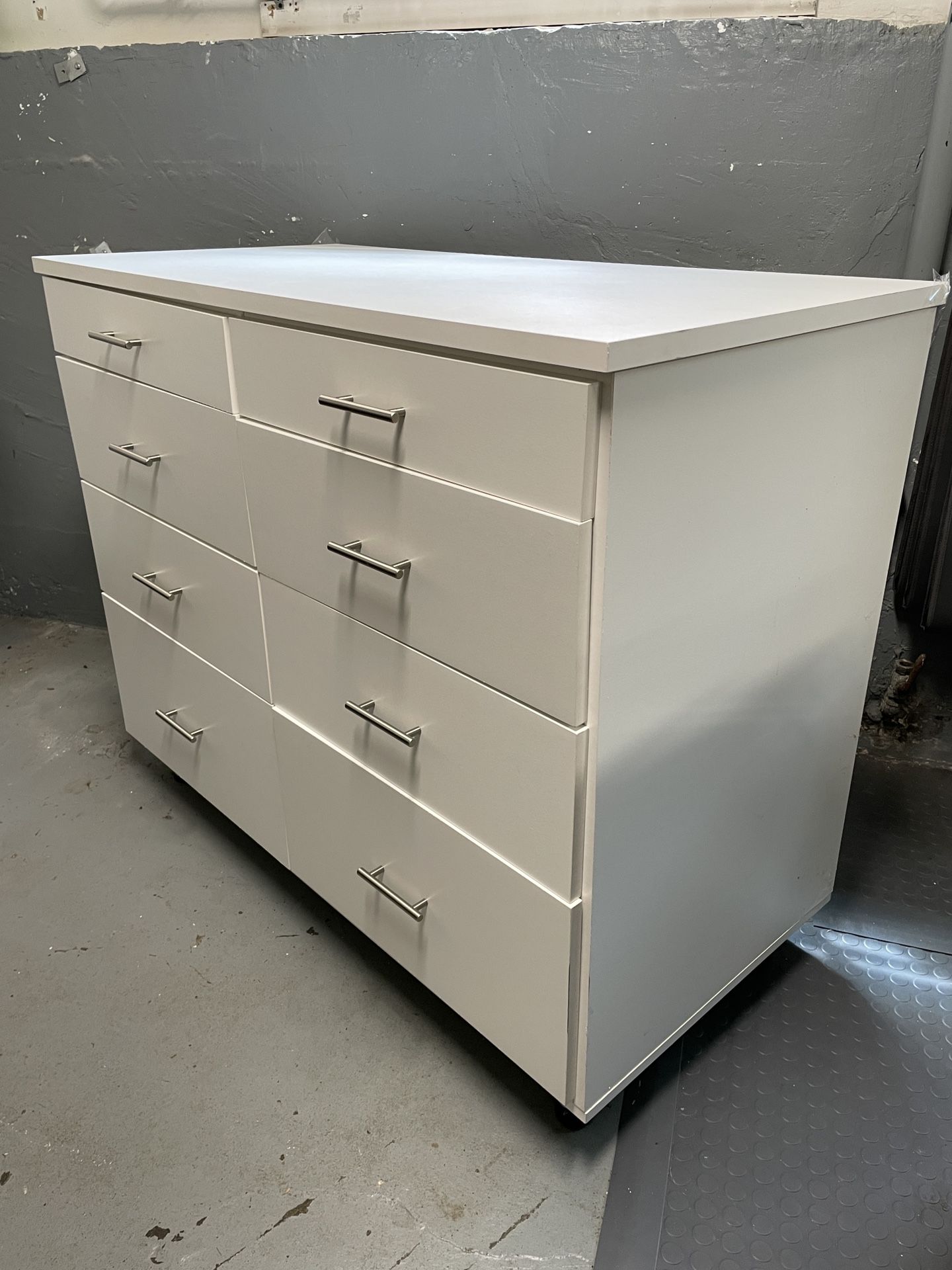 California Closets eight-drawer white utility cabinet