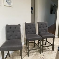 Three pub chairs in good condition
