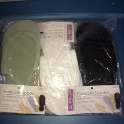 New in individual packages 6 pairs of pedicure slippers. One size fits most