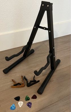 Guitar stand , 2 capos , guitar picks