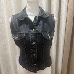 Black leather vest with silver hardware