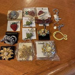 NEW BROOCHES $3.00 EACH . KEY RINGS $3.00 EACH