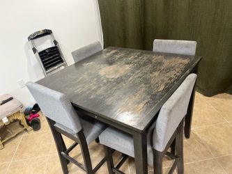 Dining table with 4 chairs.