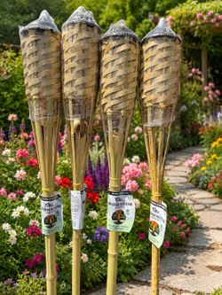 Four (4) TIKI Brand Weather Resistant Bamboo Torches