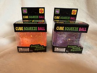 2 Cube squeeze ball with glitter.