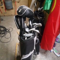 2 Sets of Golf Clubs