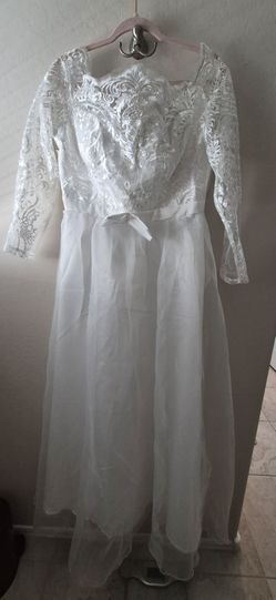 2 wedding dresses.