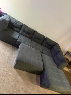 Grey sectional with large ottoman